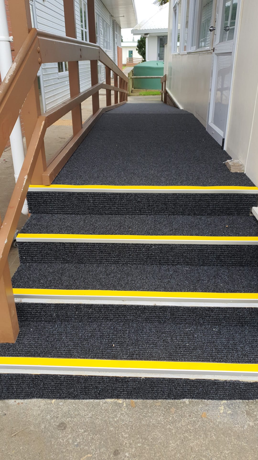 Slimrib Outdoor carpet installed on steps with safety stair nosings.